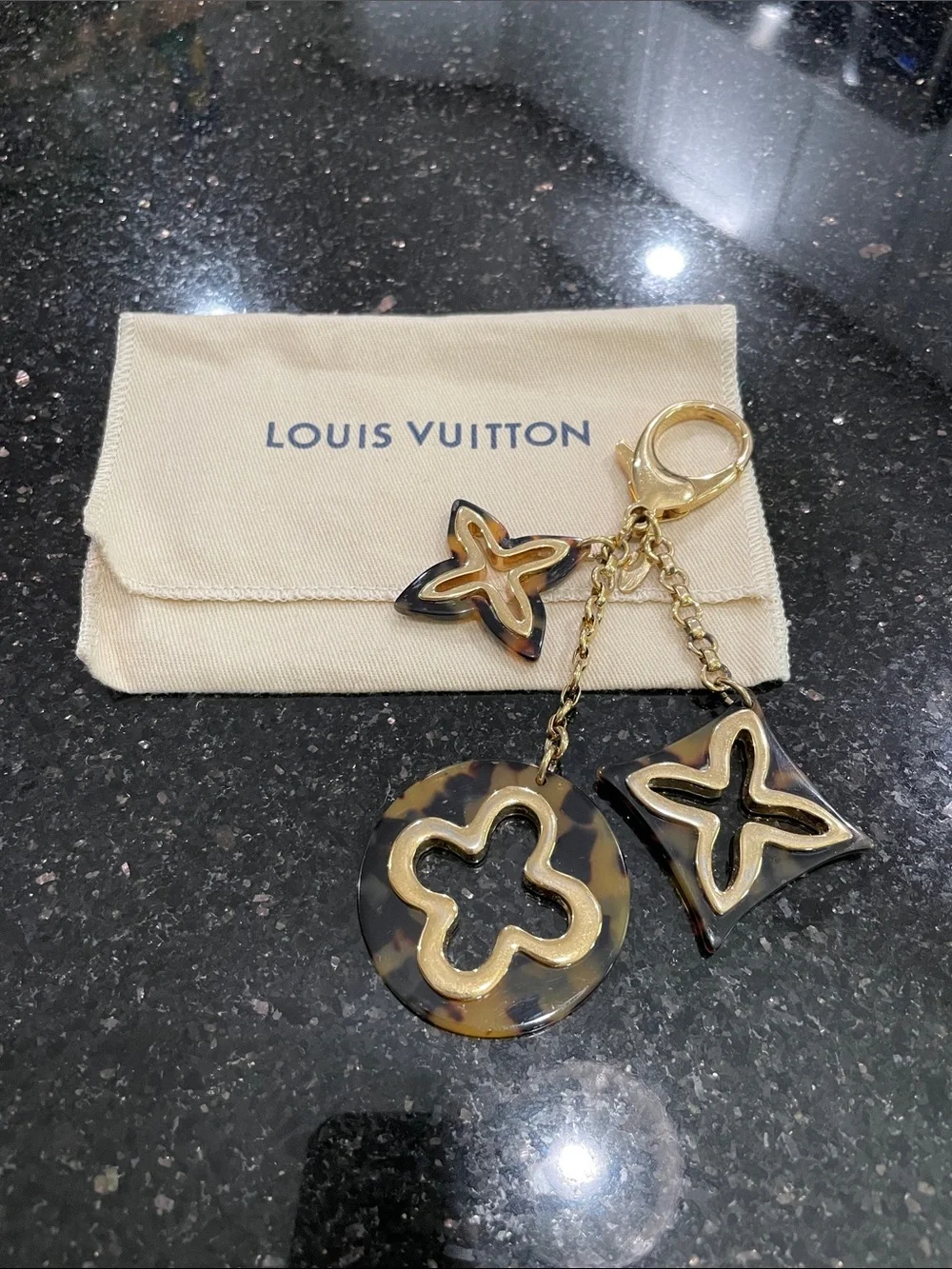 Louis Vuitton Insolence Bag Charm Metal and Tortoise Brown, Gold